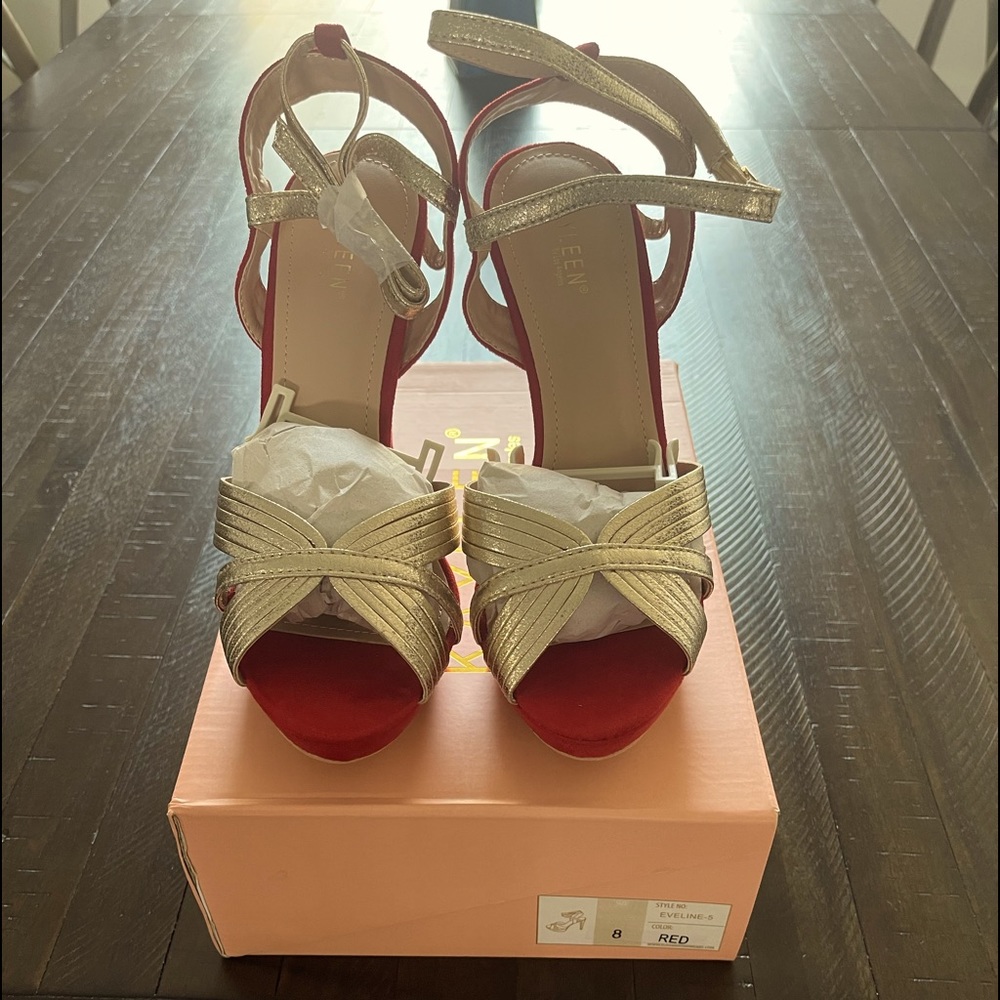 Women’s red and gold heels